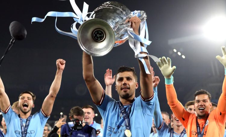 Match-winner Rodri (pictured center) with the UEFA Champions League trophy, along with this Manchester City teammates