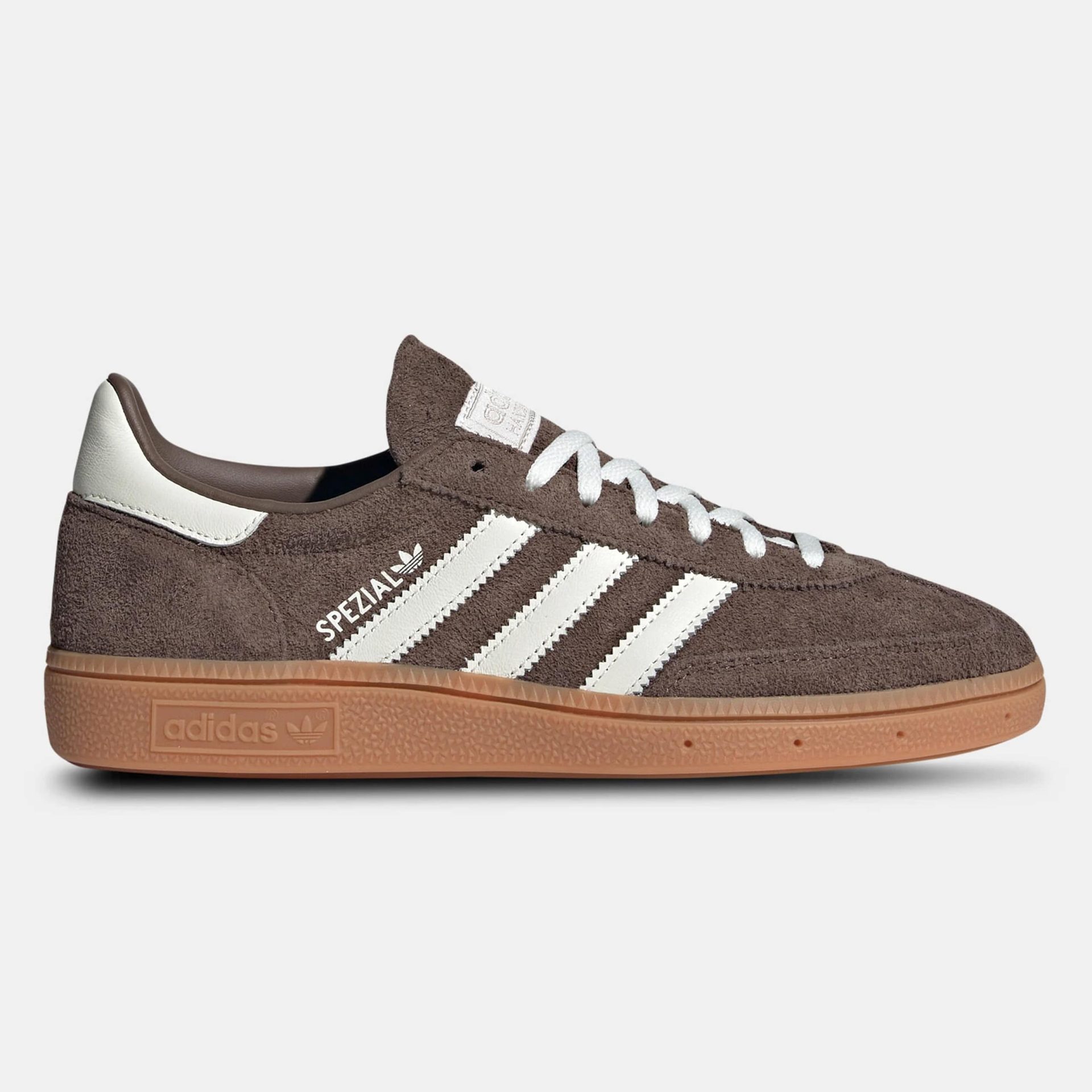 adidas Originals Handball Spezial suede sneakers in brown with white stripes and gum sole.