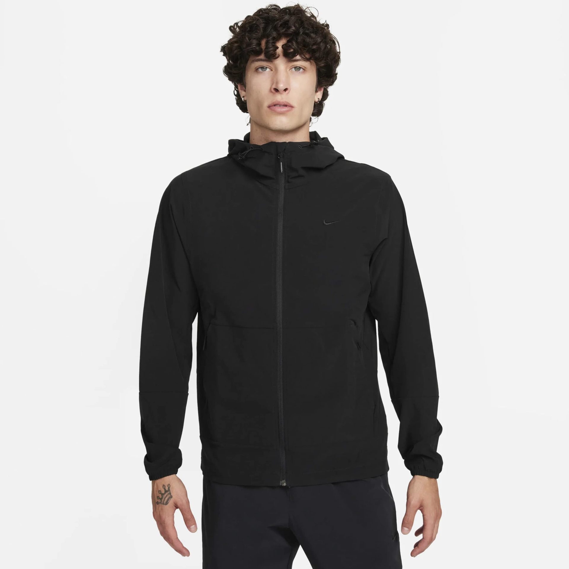 Nike men’s black zip-up jacket with hood, elastic cuffs, and minimalist design.