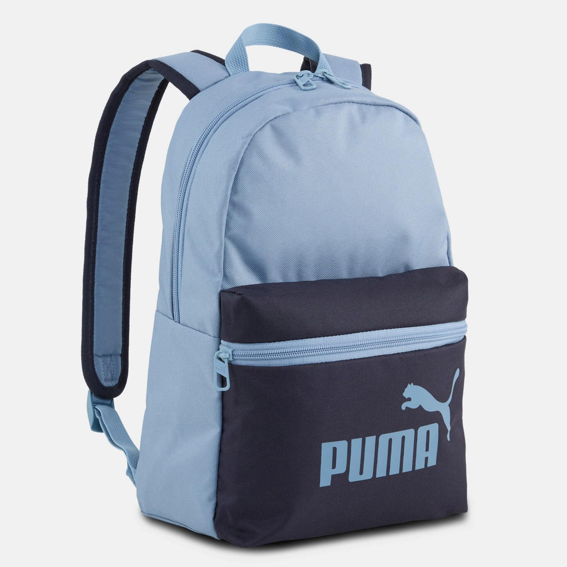 Puma kids light blue backpack with navy front pocket and logo print.